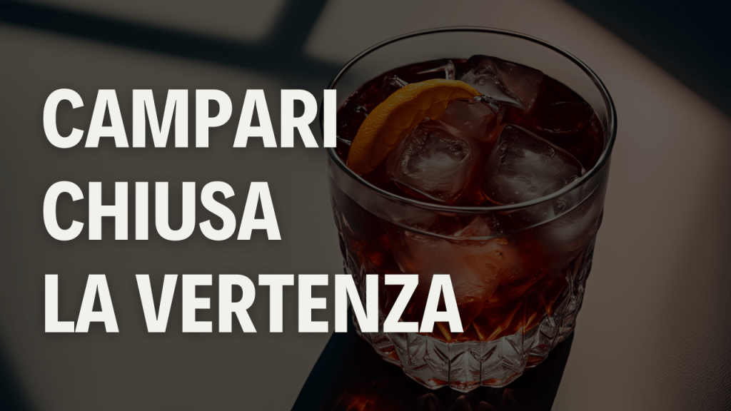 Campari: Lagfin chiude la vertenza con il Fisco italiano Immagine di un bicchiere con Campari dentro con scritta bianca.