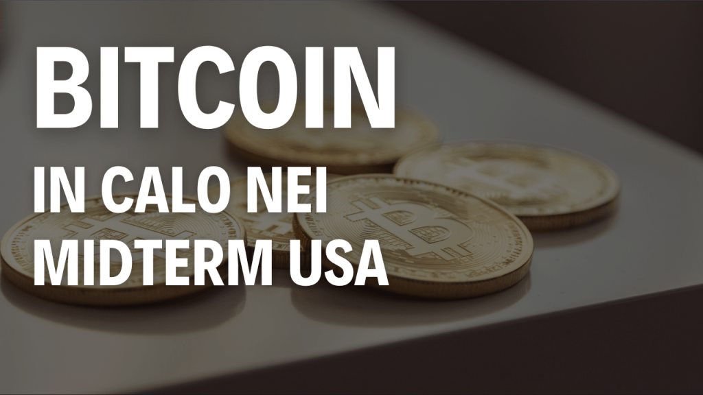 Immagine di monete Bitcoin su un tavolo e scritta "Bitcoin in calo nei midterm USA"